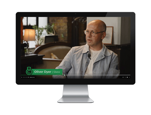 A monitor showing multiple images from Licensing Unlocked, a educational platform for the brand licensing industry. 